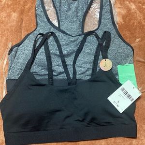 Two brand new sports bras by Forever 21 in a size large. High and medium impact